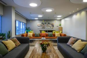 Кът за сядане в Sadot Hotel Ben Gurion Airport - an Atlas Boutique Hotel