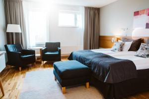 Gulta vai gultas numurā naktsmītnē Best Western Valhall Park Hotell