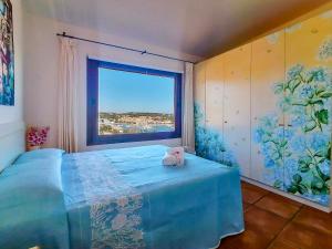 A bed or beds in a room at Sea View La Marina