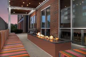 a fireplace on the side of a building at Newly Renovated - Home2 Suites by Hilton Knoxville West in Knoxville