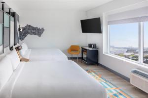 Cama ou camas em um quarto em Aloft Fort Lauderdale Airport & Cruise Port