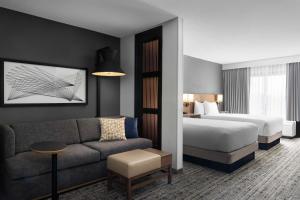 Giường trong phòng chung tại Hyatt Place San Antonio Riverwalk