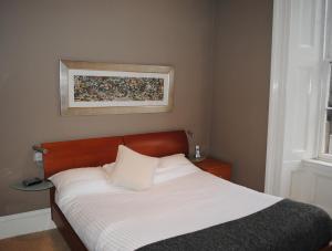 Cama ou camas em um quarto em Dreamhouse Apartments Glasgow West End