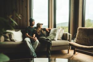 A seating area at Luxury Nordic Suite with Private Sauna and Panoramic Mountain Views