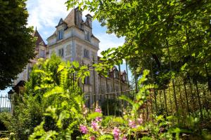 Un jardín fuera de Domaine de Monrecour - Hôtel & Restaurant - Proche de Sarlat