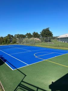 Tennis and/or squash facilities at JetPark Hamilton Airport New Zealand or nearby