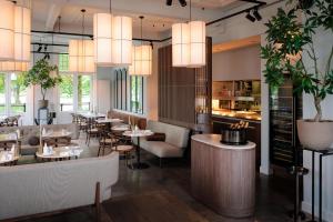 Area tempat duduk di Pillows Luxury Boutique Hotel aan de IJssel