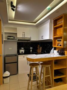 Dapur atau dapur kecil di JoyStaycation Condo Hotel