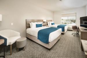 Кровать или кровати в номере Best Western Plus Executive Residency Austin - Round Rock