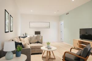 A television and/or entertainment centre at Governors Village - 1,2,3 & 4 Bedroom Apartments on Seven Mile Beach Corridor