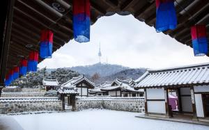 a view of a village in the snow at Parkavenue Guesthouse in Seoul