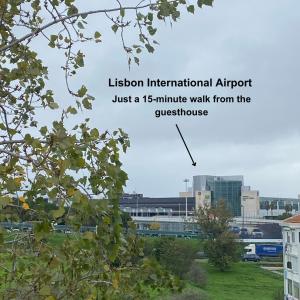 an airport view of a city with the words lesion international airport just at Lisbon Airport Guesthouse in Lisbon