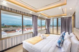 Giường trong phòng chung tại Mermaid Beach Resort