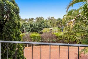 A garden outside The Swan Valley Hotel