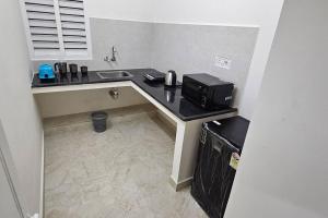 מטבח או מטבחון ב-HOMESTAY - AC 3 BHK NEAR AlRPORT