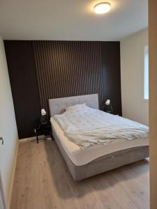 Posteľ alebo postele v izbe v ubytovaní Aalesund Guesthouse 4 Bedroom