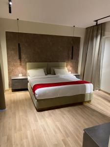 Una cama o camas en una habitación de Cordoba Suites