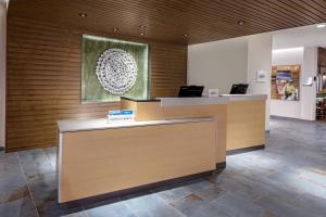 a lobby with a reception desk in a building at Fairfield by Marriott Port Clinton Waterfront in Port Clinton