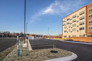 an empty parking lot in front of a building at Element Knoxville West in Knoxville