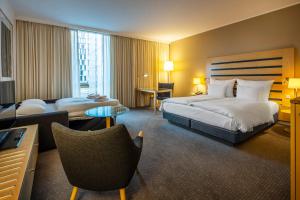 Giường trong phòng chung tại Clarion Hotel Copenhagen Airport