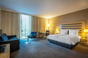 Giường trong phòng chung tại Clarion Hotel Copenhagen Airport