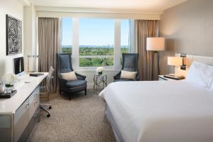 Cama ou camas em um quarto em Fontainebleau Miami Beach