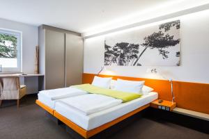 Cama ou camas em um quarto em Hotel Windschur