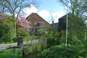 Appartement Voorhuis en chalet Klein Waterland