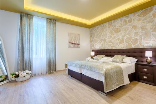 Krevet ili kreveti u jedinici u objektu Luxury Rooms Floramye