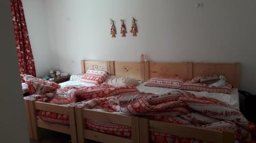 Postel nebo postele na pokoji v ubytování Olimpic Hostel