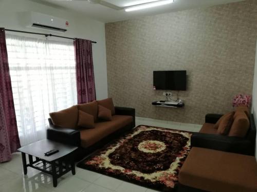 טלויזיה ו/או מרכז בידור ב-Faeyz Homestay Pertam Jaya