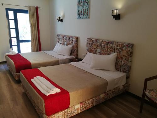 Una cama o camas en una habitación de Cordoba Suites