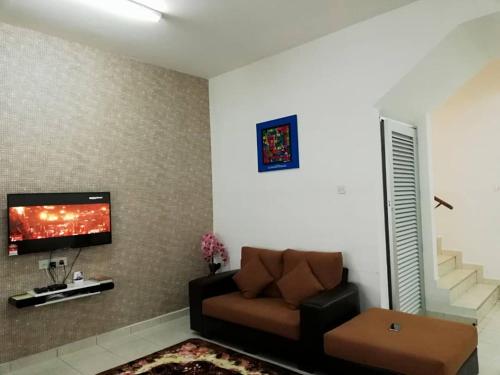 טלויזיה ו/או מרכז בידור ב-Faeyz Homestay Pertam Jaya