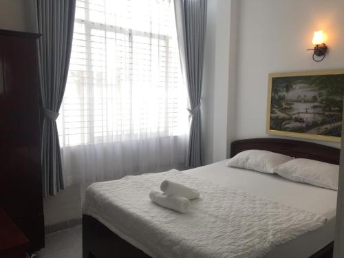 Lova arba lovos apgyvendinimo įstaigoje Vy Khanh Guesthouse