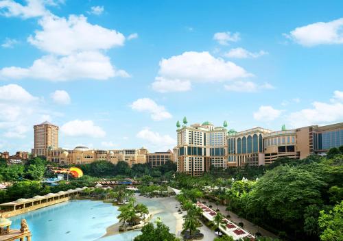 a view of a city with a large swimming pool at Sunway Resort Hotel in Kuala Lumpur