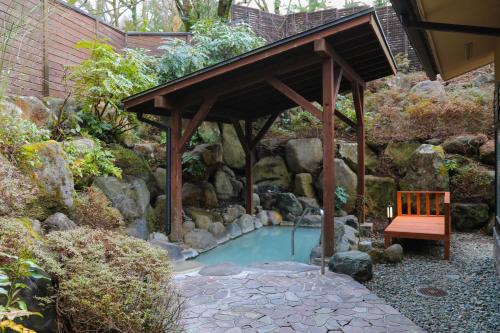 גינה חיצונית ב-Ajisai Onsen Ryokan - Award Winning Private Open Air Onsen