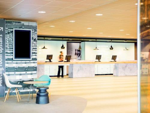 A television and/or entertainment centre at Ibis Schiphol Amsterdam Airport