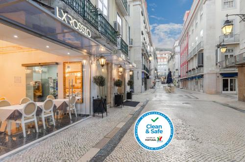 a street with a sign that says clean and safe at Hotel LX Rossio in Lisbon