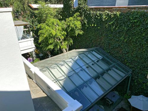 an overhead view of a glass roof on a building at Hotel Villa Condesa in Mexico City