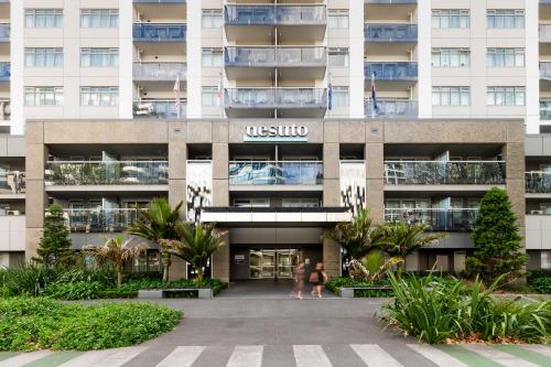 a building with the name of the hotel at Nesuto Stadium in Auckland