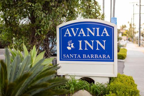 a blue and white sign for aanuimim sign at Avania Inn of Santa Barbara in Santa Barbara