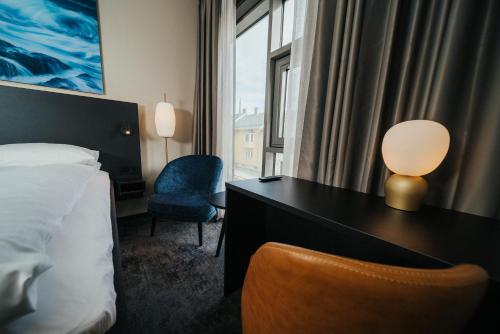 En eller flere senger på et rom på Comfort Hotel Bodø