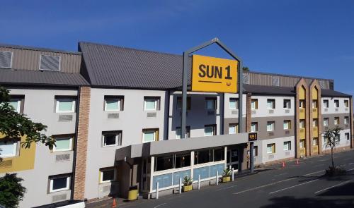 a building with a sign that says sun on it at SUN1 Durban in Durban