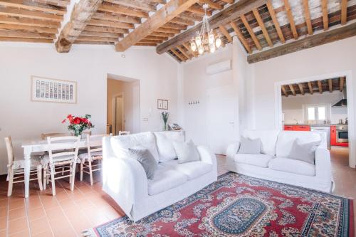 A seating area at Holiday Home Il Borgo Degli Agrumi