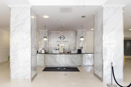 a lobby with a marble counter in a building at Ocean Reserve - Park View 1 Bedroom in Miami Beach