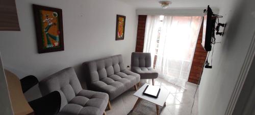 En sittgrupp på Hermoso Apartamento Ubicado en Zona Céntrica de Medellín