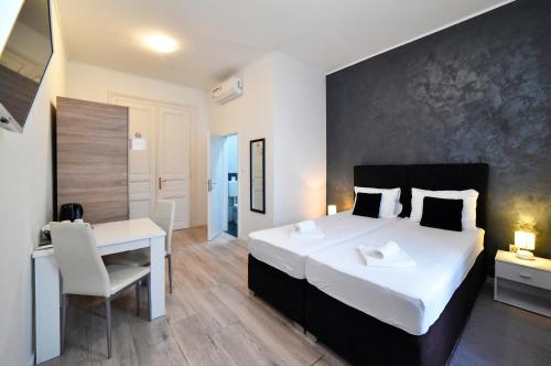 Krevet ili kreveti u jedinici u objektu Virtus Apartments and Rooms with Free Private Parking