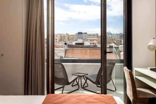 A balcony or terrace at Empire Marquês Hotel