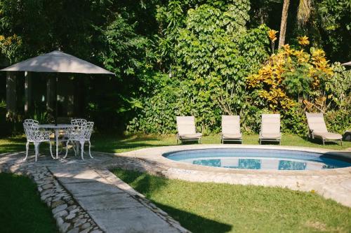 Un jardín fuera de Hotel Nututun Palenque