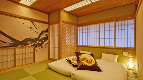 Krevet ili kreveti u jedinici u objektu Stay SAKURA Tokyo Asakusa Yokozuna Hotel